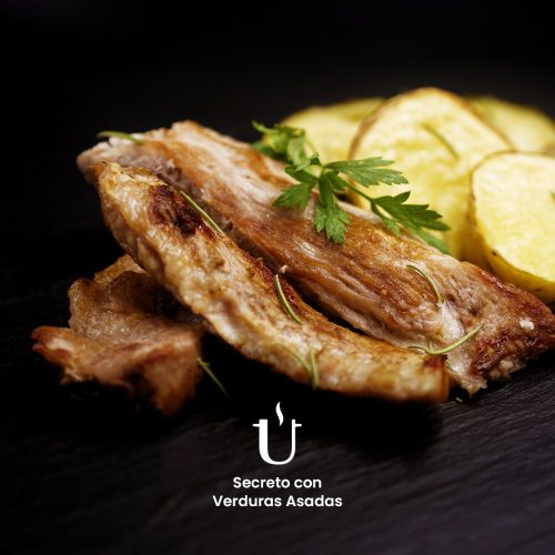 Secreto con Verduras Asadas Raggú