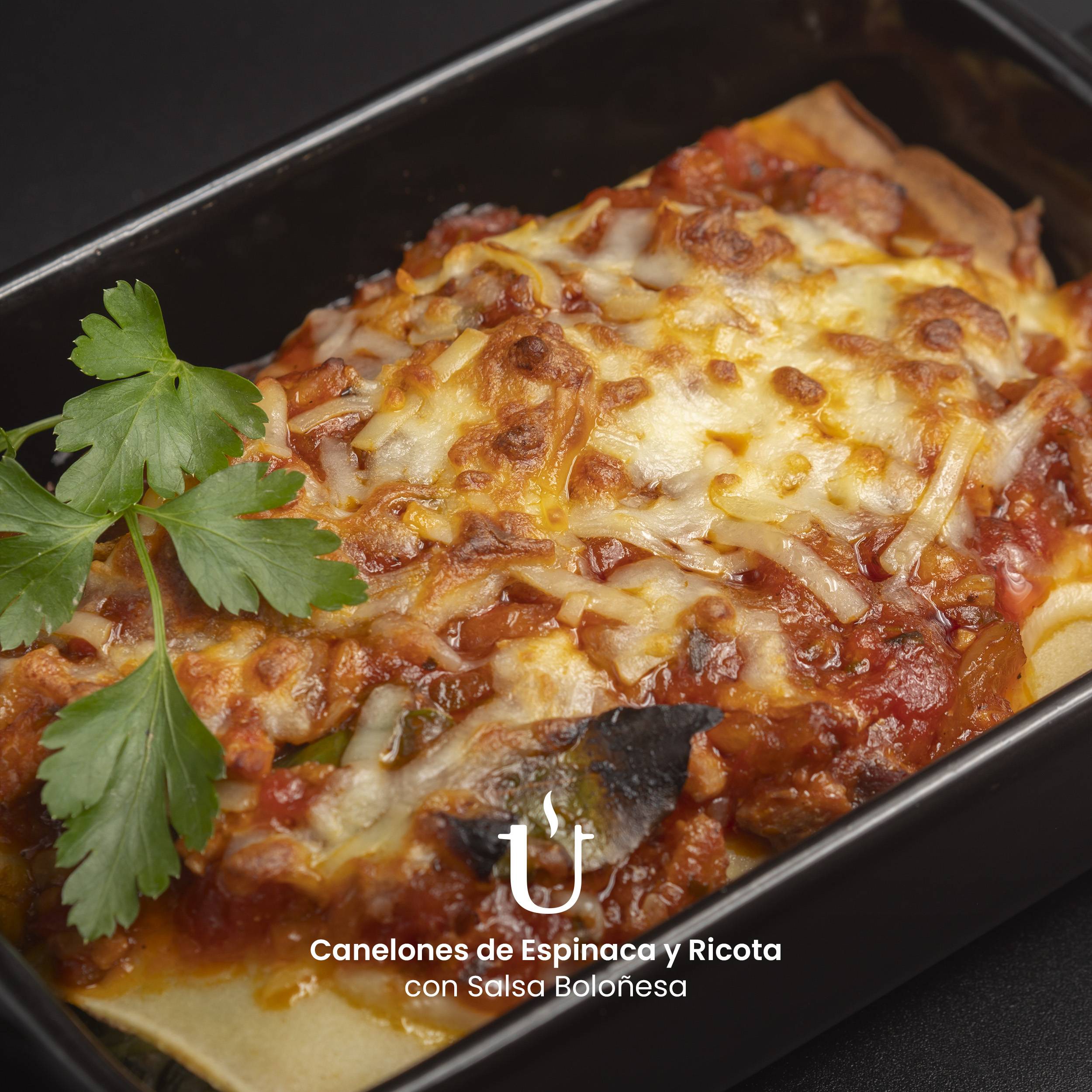 Canelones de Espinacas y Ricota con Salsa Boloñesa